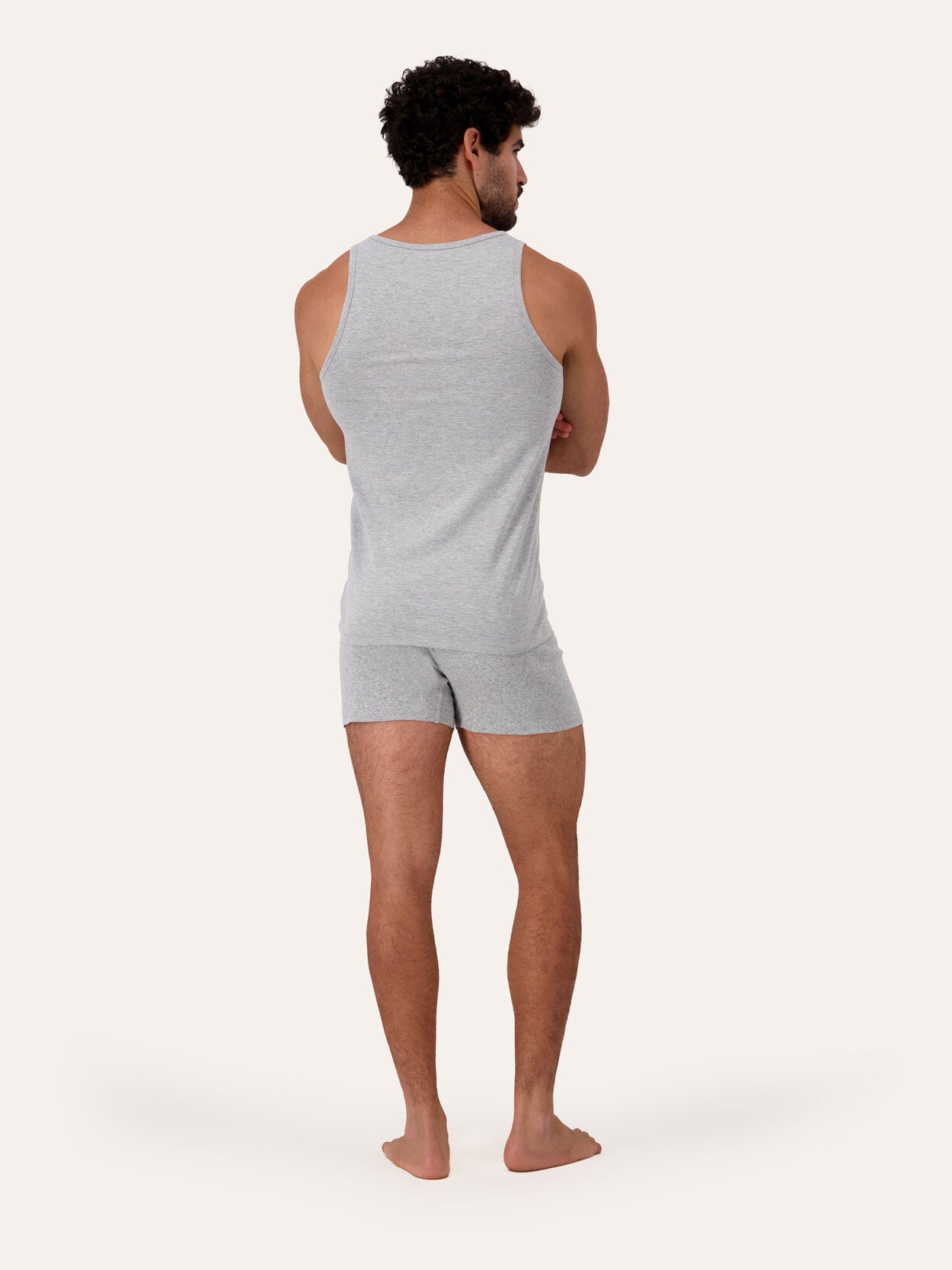 Gray Melange | West Corner tank top in gray melange — back, on model