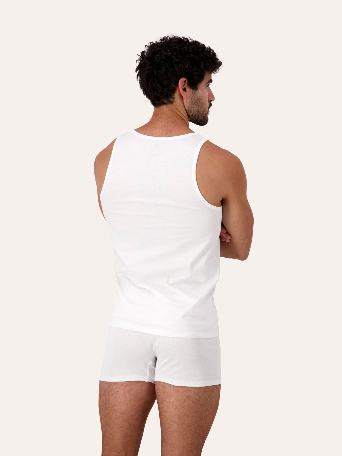 1 Pack / 3 Pack | West Corner tank top in white — back, three-quarter, on model