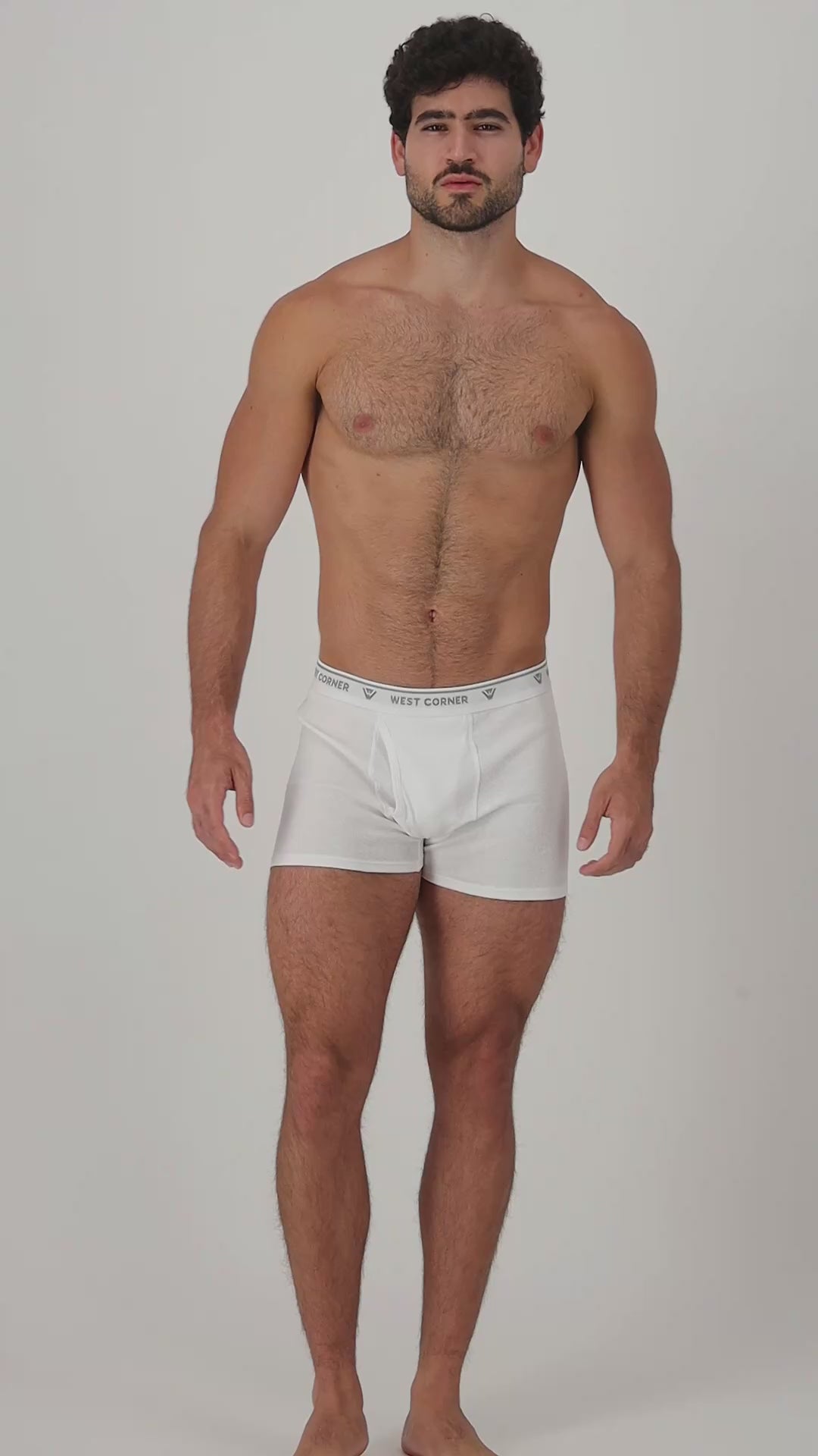 Model wearing white West Corner boxer briefs